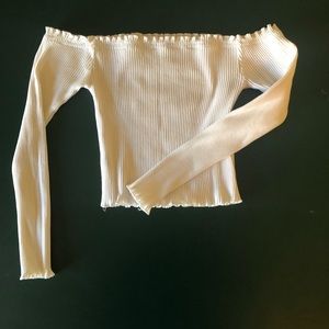 White ribbed off the shoulder fitted crop top.